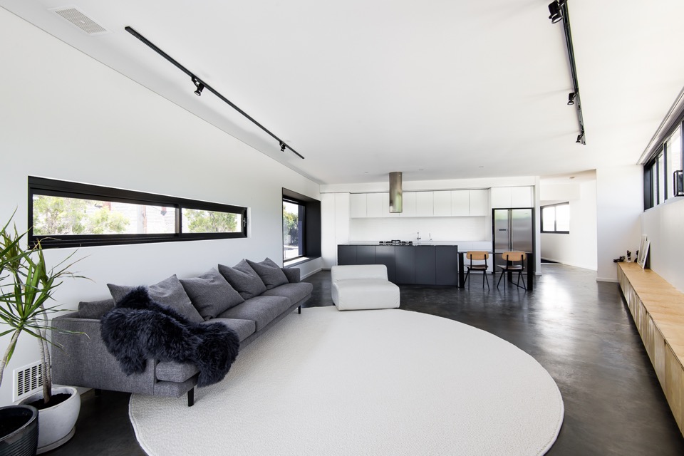 Monochrome Living Room Kitchen. Local heroes: Triangle House by Robeson Architects. Image by Dion Photography. Vincent St, Mt. Lawley. Perth Residential Architecture. 
