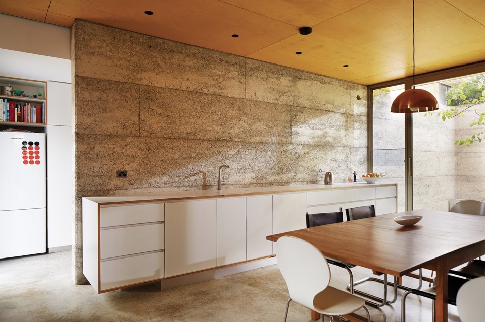 Lake House by Jonathan Lake Architects, North Perth. Structural rammed concrete walls are revealed as a raw, textural backdrop for kitchen and living spaces. #Architecture #Perth #Interiors