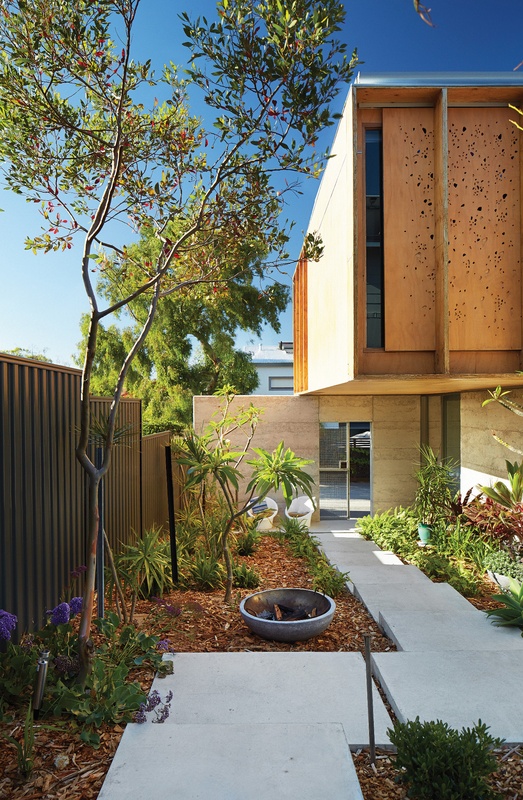 Lake House by Jonathan Lake Architects, North Perth. Colour-filled perforations in the plywood screens act as both an artwork and visual privacy, sun-shading and temperature control. #Architecture #Perth