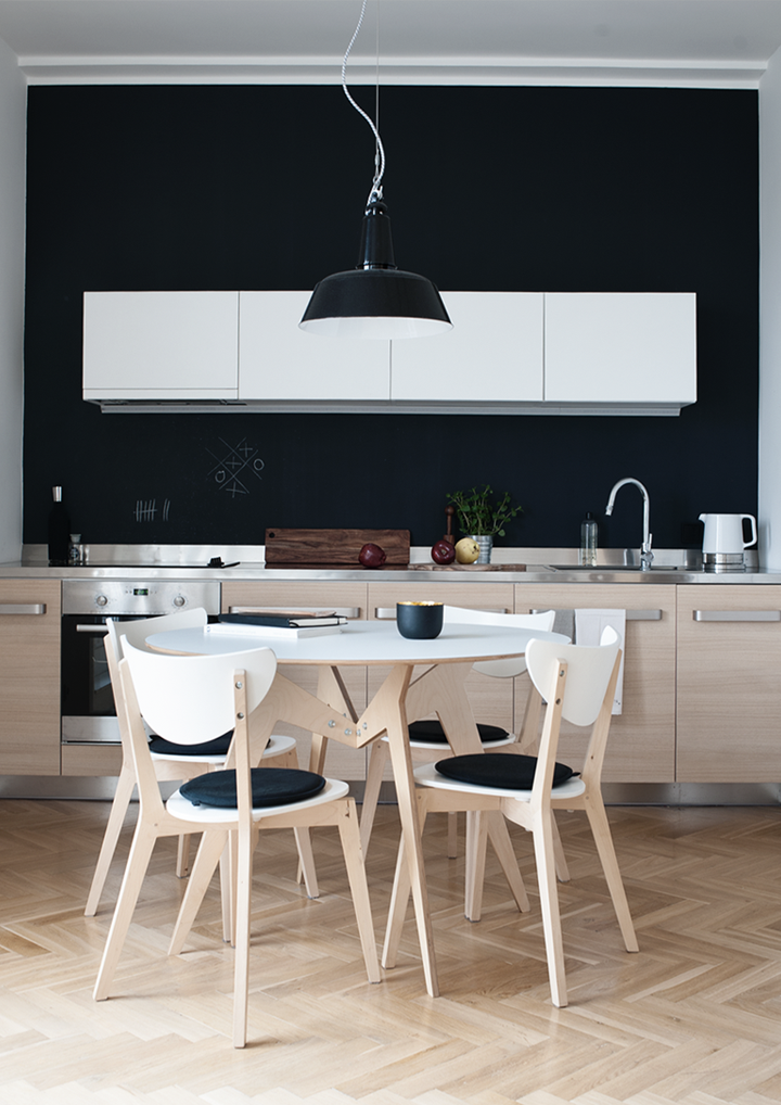 #Black, #white and #timber kitchen in Martin Neruda and Jana Štastna's Czech apartment in Prague. From The #Monochrome #Kitchen, the RSD Blog.